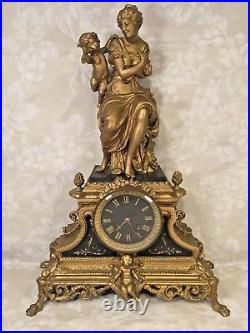 Antique Japy Freres Gold and Black French Clock Woman with Cupid Topper