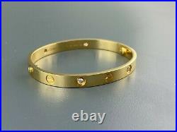 Authentic Cartier 4 diamond 18k Yellow gold love bracelet size 16