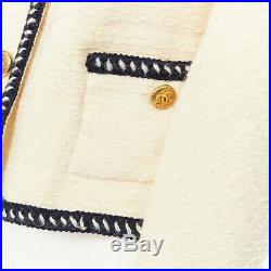 CHANEL 80s vintage ecru tweed navy braid trim gold CC button collarless jacket