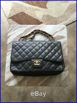 CHANEL Jumbo Black Classic Quilted Caviar Leather Single Flap Gold Chain Purse