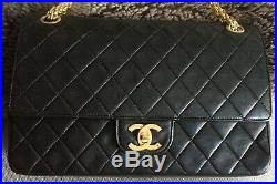 CLASSIC CHANEL Black Quilted Lambskin Reissue Gold Chain Medium Double Flap Bag
