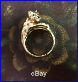 Genuine 18kt gold Cartier panther ring. Emerald eyes. Onyx nose. MIB