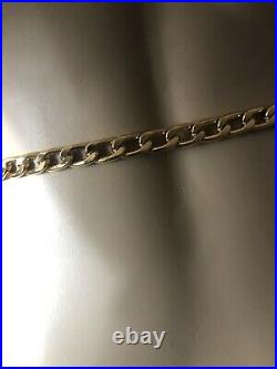 Gold triple chain front with hanging CC belt signed by Chanel
