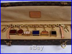 Magnificent Louis Vuitton 18k Gold Charm Luggage Bracelet 6 Charms With Box