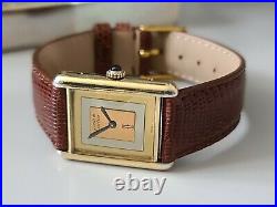 Must de Cartier Tank Mechanic 18ct Gold on Silver in very good cond unisex + box