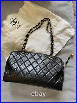 Vintage CHANEL Black Quilted Duffle Shoulder Bag with Gold Chain