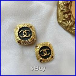 Vintage CHANEL clip on earrings Made In France Black And Gold Logo